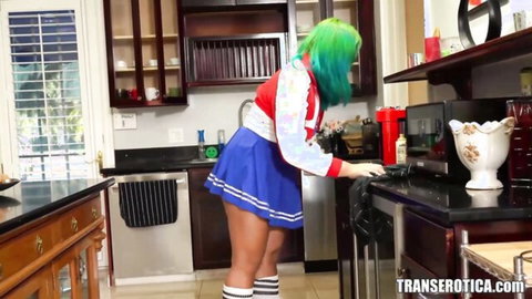 Neon green haired trans babe in sailor schoolgirl skirt bends over kitchen counter teasing upskirt