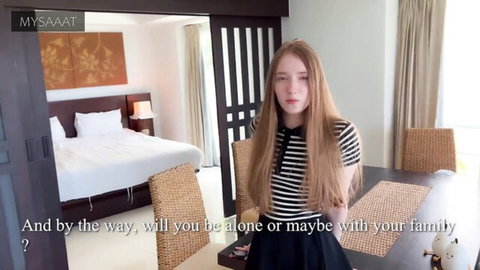 Young redhead realtor in striped top and skirt seduces tourist