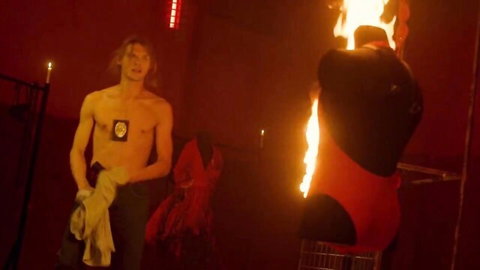Hilda Karmen topless boobs in fiery dramatic scene