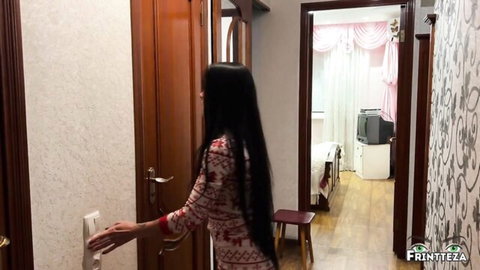 Frintteza as stepmom in Christmas sweater searching decorations alone
