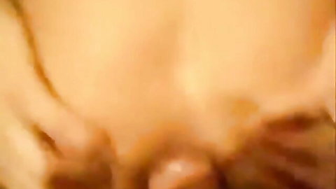 Blurry close-up of woman's stretched asshole leaking thick creampie after anal sex