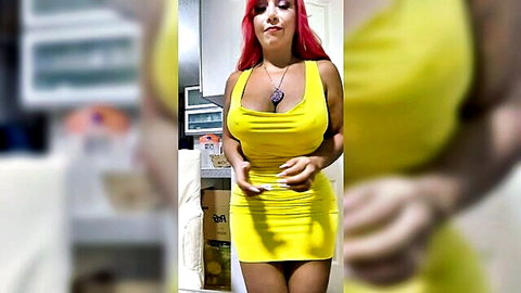 Busty redhead Latina MILF teasing in tight yellow mini dress with massive cleavage and curves