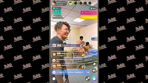 Japanese webcam threesome in hospital with smiling doctor, nude muscular man and woman on bed