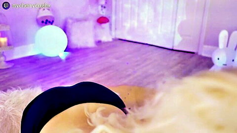 Blonde babe teasing with bare ass in playful pose