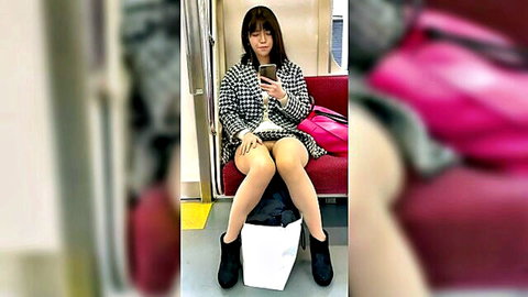 Asian woman in short skirt upskirt view on train, teasing thighs