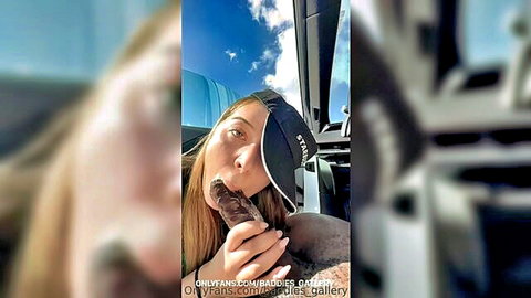 Blonde in Supreme cap teases deepthroat blowjob on thick brown dildo in car