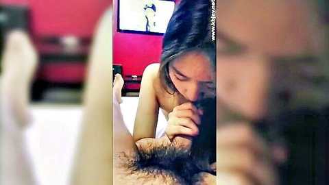Korean babe with bare tits sucking hairy cock in closeup oral sex