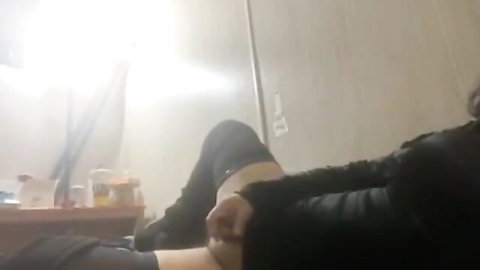 Latina sissy slut in leather teasing handjob pose
