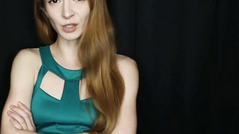 Jackie Marie Jupiter in teal cutout bridesmaid dress, redhead teasing pose