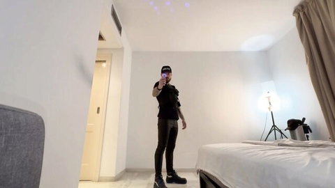 Muscular cop Max Dennison in tight black uniform posing selfie