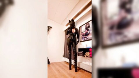 Latex dominatrix in catsuit poses seductively for POV human bench fetish
