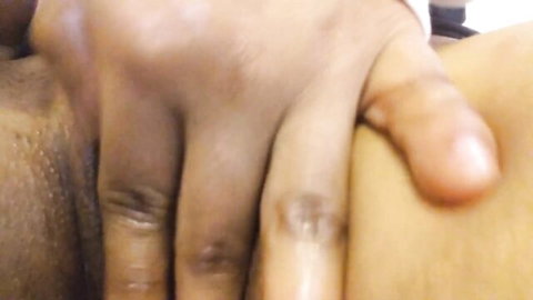 Goddess Varian grips massive ebony dildo in close-up solo tease
