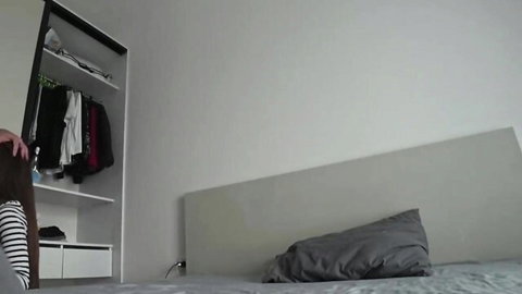 Amateur wife in striped top near marital bed, real cheating setup