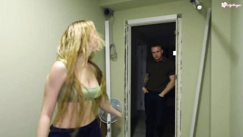 Blonde big tits babe in bra startled by sneaky guy peeking from basement door