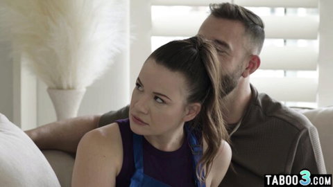 Alison Rey in purple top, tense with bearded landlord behind her on couch