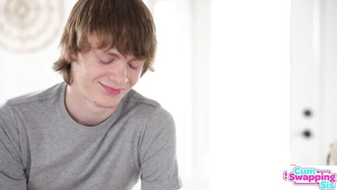 Cute shaggy-haired guy smiling in t-shirt for stepsis erotic breast massage