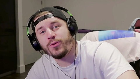 Blonde man in headphones and cap for alien hentai seduction session