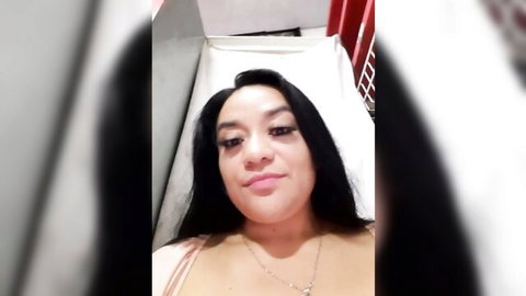 Indira Nahali sexy selfie in low-cut top, smiling close-up, amateur tease