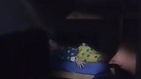 Italian lesbian scene with woman in yellow polka-dot dress on bed