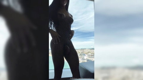 TSJoaFitness in sheer sparkly bodysuit exposing cock on balcony