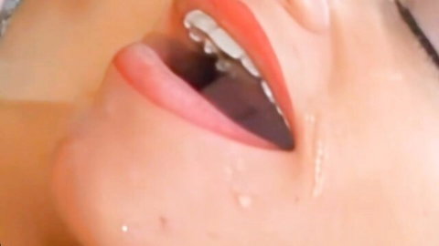 Marie McCray's open mouth close-up in steamy lesbian oral massage