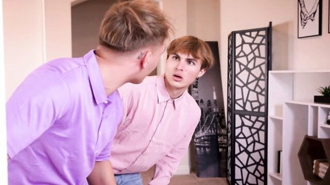 Two young stepsons in collared shirts talking intimately