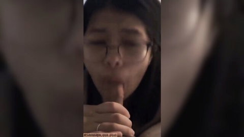 Asian nerdy GF sucking BF's cock in closeup blowjob video