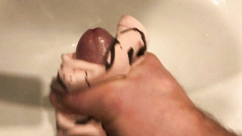 Hand squeezing wet stepmom's plump pussy in sink, messy laundry taboo close-up