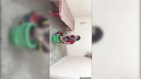 Priyanka Barnitta bending over in red outfit, teasing big ass during cleaning