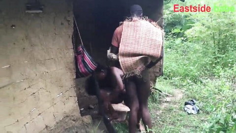 Ebony hunter fucks curvy tribal woman doggy style outdoors