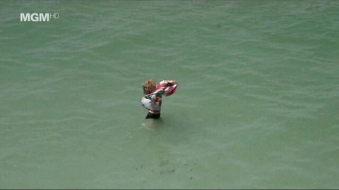 Jessica Lange topless in shallow turquoise water, Blue Sky 1994
