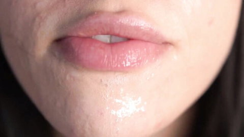 Petite brunette teen lips dripping with spit in POV fetish solo