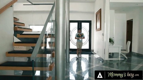 Lexi Luna in MILF stepmom fantasy, smiling seductively at home