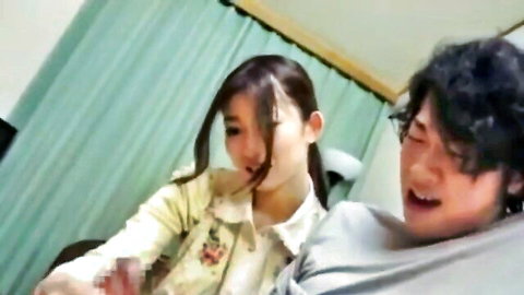 Japanese stepmom in yellow top intimately caring for stepson in bedroom