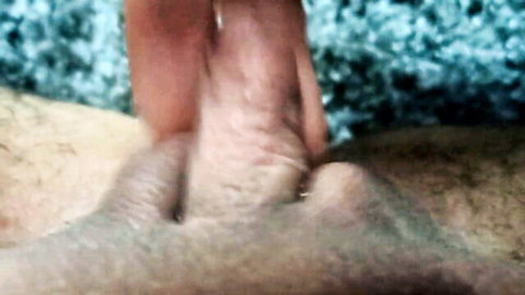 Edwin Crichton solo masturbation close-up, hairy cock gripped by hands