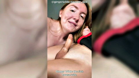 Ginger woman smiling close to trans Eevee Bee's cock in oral scene