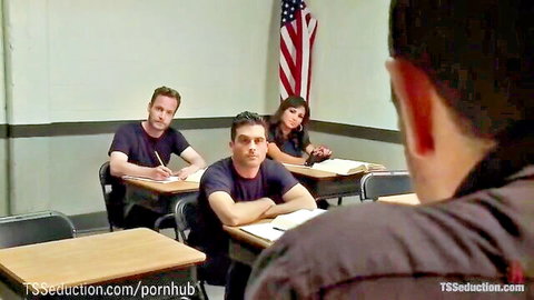 TS seductress dominates police academy recruits in classroom scene