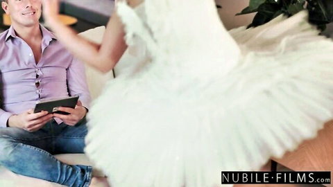 Ballerina Betzz in white tutu seductively dances near boyfriend's lap
