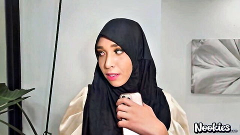 Briana Moon as cute hijab girl in black scarf, smiling with phone, sexy tease