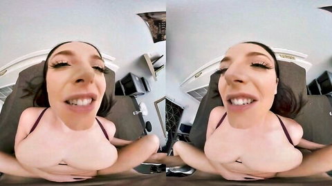 Topless curvy babe with huge tits smiling wide mouth open in distorted POV VR view
