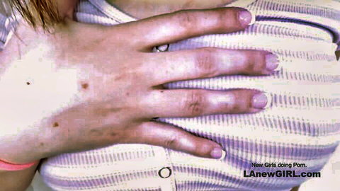 Babe's hand with pink nails spreading open wet shaved pussy lips closeup