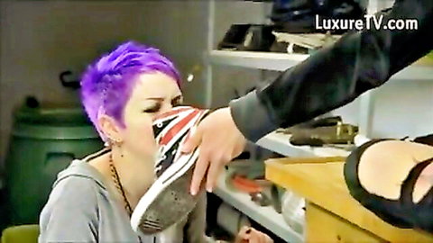 Purple-haired young lesbian slave worships sneakers in foot fetish scene