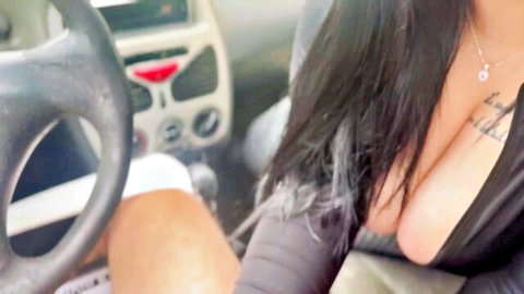 Brunette with huge tits and chest tattoos flashes deep cleavage in car