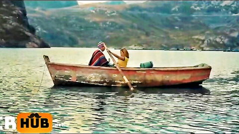 Vitoria Beatriz in yellow top rowing boat on Andes lake, outdoor tease