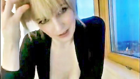 Alexis Kline blonde babe teasing in open black top, sexy cleavage view