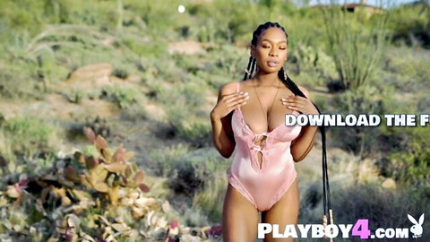 Black teen with big natural tits in pink lingerie posing outdoors