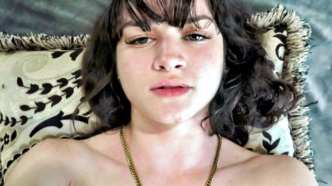 Remi Raw topless lounge in Malibu Park Part 2, seductive brunette gaze