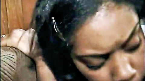 Ebony woman moaning in ecstasy as man roughly pulls her wet hair