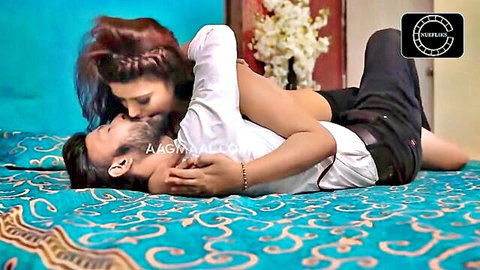 Indian beauty embraces boss in steamy massage foreplay on bed
