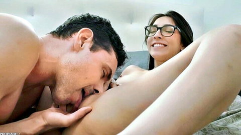 Madison Wilde smiles as stud performs cunnilingus on her in bed